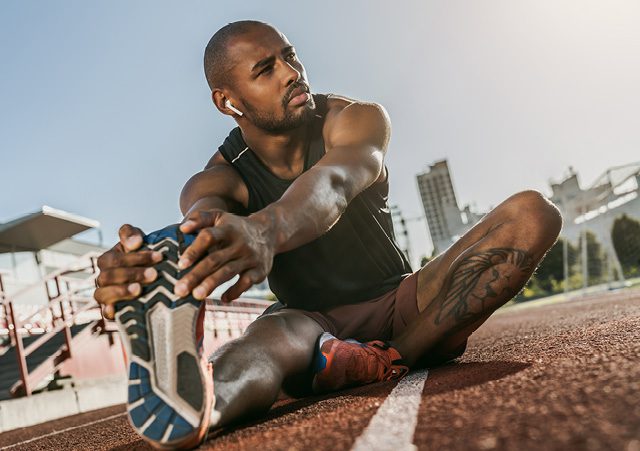 Athlete stretching 