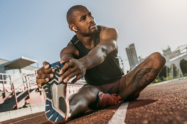 Athlete stretching 