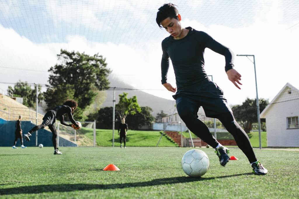 Football player running with the ball