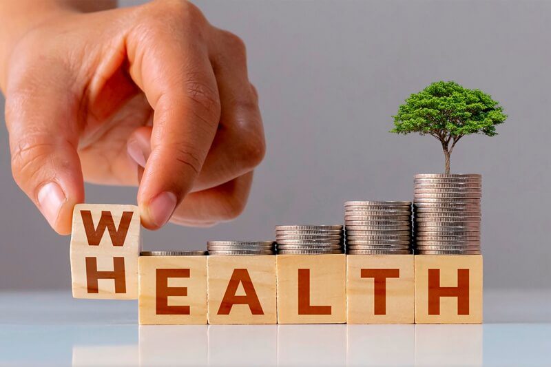 wealth vs health wooden cubes